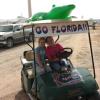 Florida Girls just want to have fun.... watch out for that Gator cart!